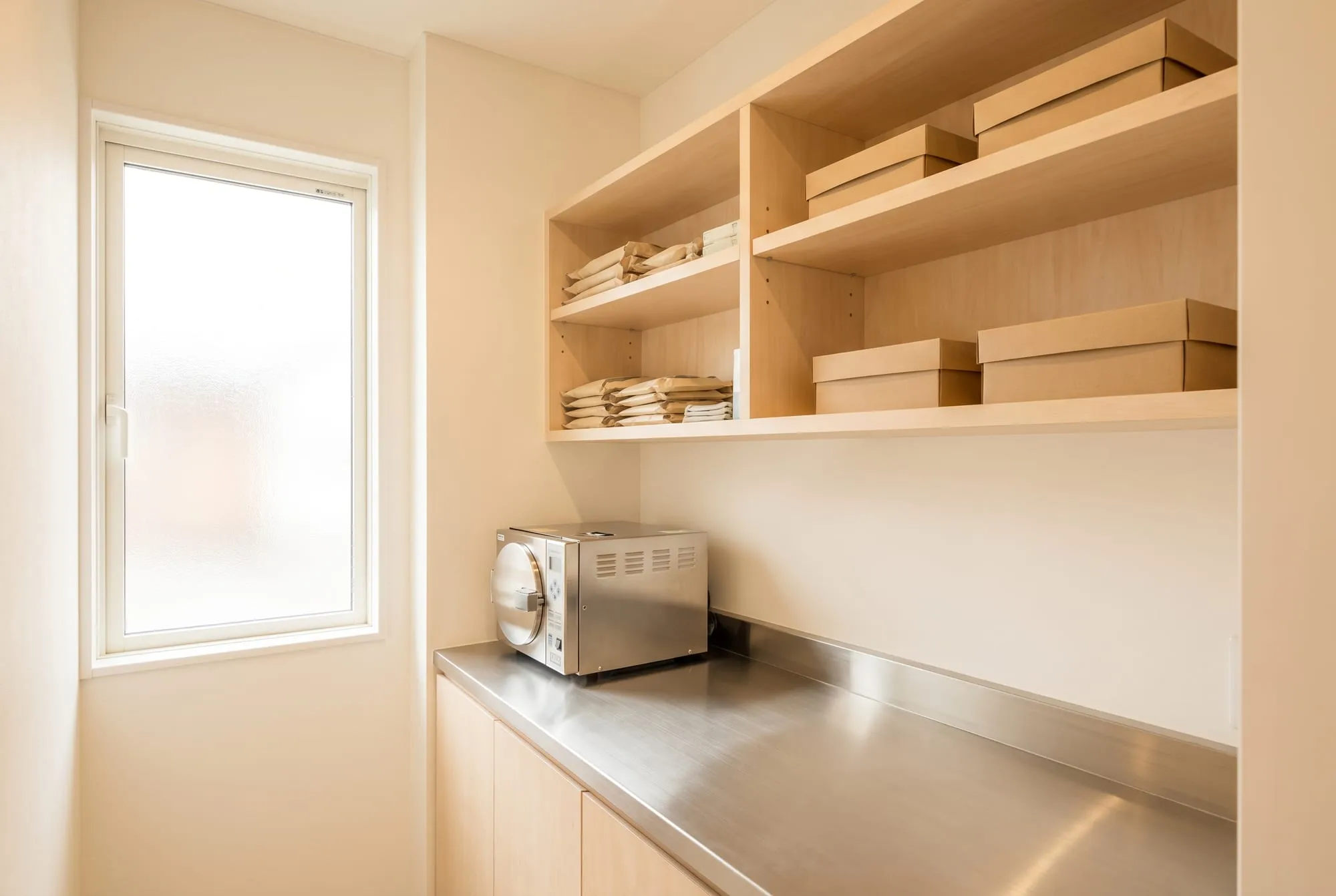 Sterilization room with closed instrument boxes on a shelf